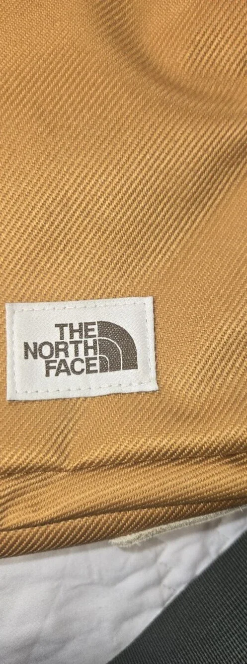 The North Face compact mustard